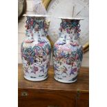 A pair of 19th century Chinese famille rose vases, height 46cm (a.f.)