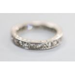 A white metal and diamond set full eternity ring, size K/L, gross 3.5 grams.CONDITION: Two of the