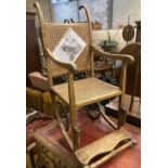 An early 20th century 'Wardway' caned beech invalid's chair, width 50cm, depth 80cm, height 118cm