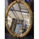 A Victorian style oval gilt framed wall mirror, width 75cm, height 94cm