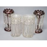 A pair of Victorian ruby overlaid table lustres and a pair of late Victorian clear glass table