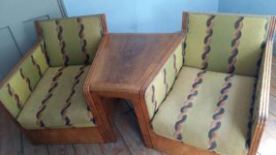 An Art Deco oak three section conversation seat, possibly with its original upholstery, width 170cm,