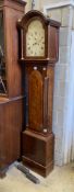 E. Buckwell, Brighton. A late 18th century mahogany eight day longcase clock, with painted arched