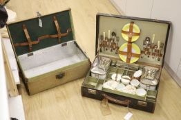 A vintage French picnic set and canvas picnic hamper