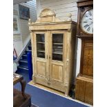 A 19th century French pine armoire, width 124cm, depth 56cm, height 214cm