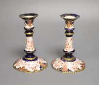 A pair of Royal Crown Derby candlesticks, height 15cm