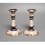 A pair of Royal Crown Derby candlesticks, height 15cm