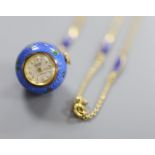 A Swiss blue enamelled and yellow metal globular fob watch on a gilt metal and enamelled chain,