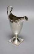 A George III silver helmet cream jug, indistinct maker's mark, London, 1791, 20cm, 5.5oz.