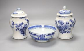 A pair of 19th century Chinese blue and white jars, 21cm high including lids and covers and a