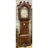 A Victorian banded mahogany eight-day longcase clock, Richard Blakeborough, Otley, having painted