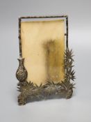 An early 20th century Chinese white metal photograph frame. by Wang Hing, 18.2cm.