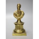 A 19th century brass bust of Wellington, 21cm high and two prints