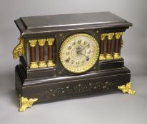 An American ebonised mantel clock, length 46cm