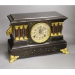 An American ebonised mantel clock, length 46cm