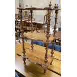 A Victorian marquetry inlaid walnut three tier whatnot, width 50cm, depth 34cm, height 97cm