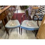 A set of six Hepplewhite style mahogany shield back dining chairs with tapestry drop in seats (two