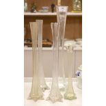 Five late Victorian tall fluted glass flower vases, 59.5cm high