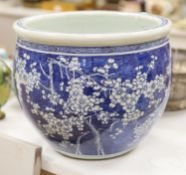 A large Chinese blue and white 'Prunus' jardiniere, late 19th/early 20th century, 31cm high