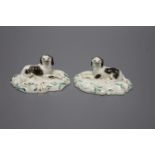 A pair of Staffordshire porcelain recumbent King Charles spaniels, c.1840, height 5cmCONDITION: ex