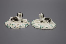A pair of Staffordshire porcelain recumbent King Charles spaniels, c.1840, height 5cmCONDITION: ex