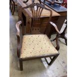 A George III Hepplewhite style mahogany elbow chair