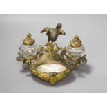 A 19th century French brass gilt metal and mother of pearl 'crane' desk stand, height 13cm