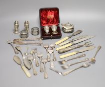 A cased pair of Victorian silver peppers, Sheffield, 1891, 79mm, five other silver condiments, three