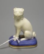 An English porcelain recumbent pug, c.1830-50, height 7cmCONDITION: ex Dennis G. Rice collection.