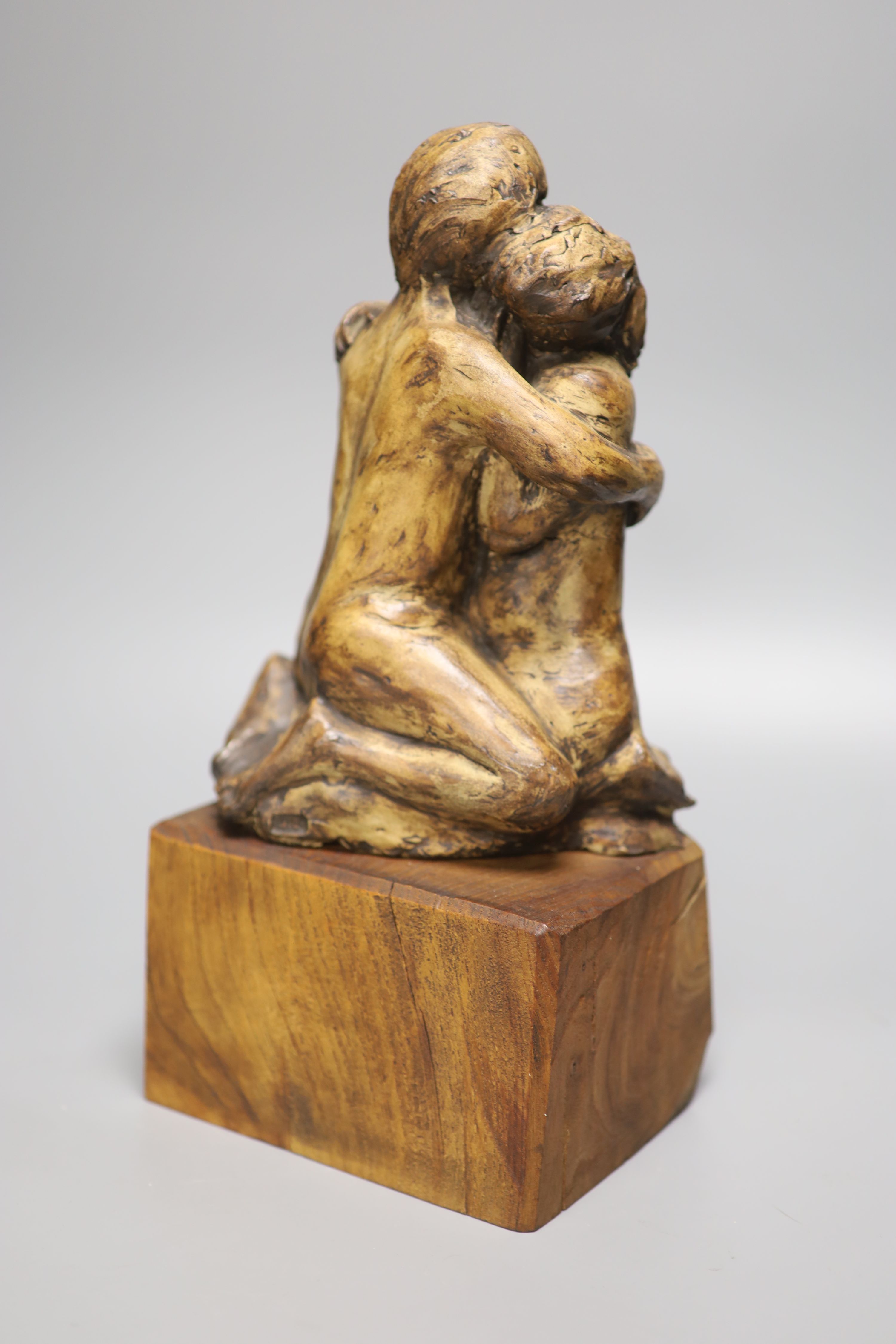 A resin sculpture of lovers on hardwood base, stamped to reverse PHD, height 34cm - Image 2 of 2