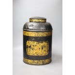A large late 19th / early 20th century Chinese toleware tea canister, the cover with embossed