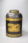 A large late 19th / early 20th century Chinese toleware tea canister, the cover with embossed