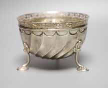 A late Victorian silver bowl, with pierced border of tripod feet, Wakely & Wheeler, London, 1895,