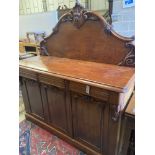 A Victorian carved mahogany sideboard fitted drawers and cupboard, length 150cm, depth 56cm,