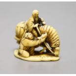 A 19th century ivory netsuke horse group, height 4cm, three character signature