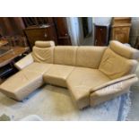 An Italian beige leather curved corner sofa, length 250cm, maximum width 160cm, height 90cm