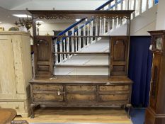A late 18th century oak dresser, length 218cm, depth 46cm, height 228cm
