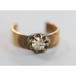 A diamond solitaire and gold ring (tests as 14ct), cut, gross 6.1 grams.
