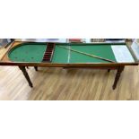 An early Victorian mahogany bagatelle table, width 120cm, depth 64cm, height 90cm