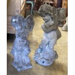 Two reconstituted stone garden cherub ornaments, larger 70cm high