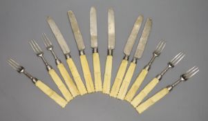 A set of six pairs of late George III ivory handled silver dessert eaters, Joseph Wilmore,