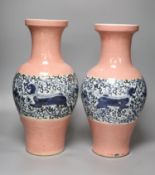 A large pair of 20th century Chinese crackle glaze vases, of tapering baluster form, with pink
