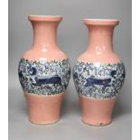 A large pair of 20th century Chinese crackle glaze vases, of tapering baluster form, with pink