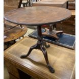 A George III mahogany circular tilt top birdcage tea table, 75cm diameter, height 70cm