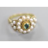 A Victorian yellow metal, split pearl and emerald? set circular cluster ring, size O, gross 4