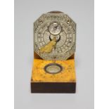 A reproduction Butterfield style scale and a Chinese compass/sundial, longest 12cm