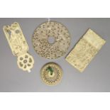 Three pieces of 19th century Chinese export carved ivory to include a card case, a pomander and a