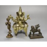 An Indian bronze figure of Ganesh, a bronze of a dancer and a bronze of the Lion of Venice,