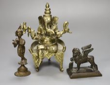 An Indian bronze figure of Ganesh, a bronze of a dancer and a bronze of the Lion of Venice,