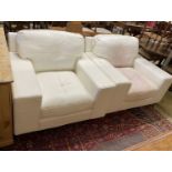 A pair of contemporary white leather armchairs, width 104cm, depth 98cm, height 88cm